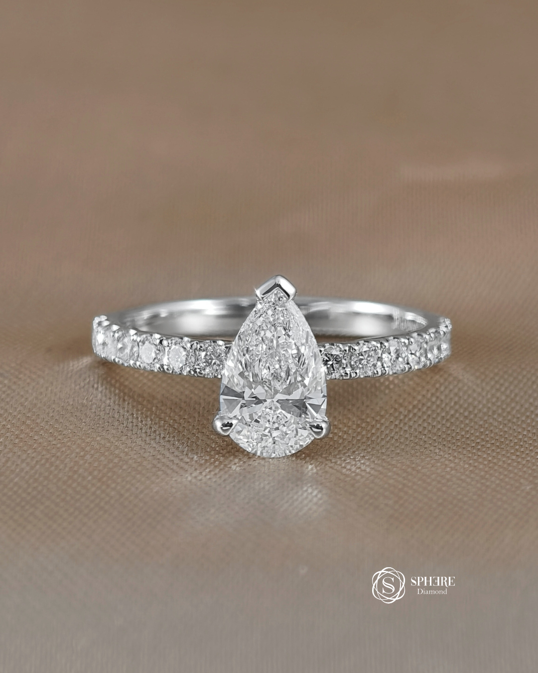 Tear of Light – Pear Diamond Ring with Pave Band
