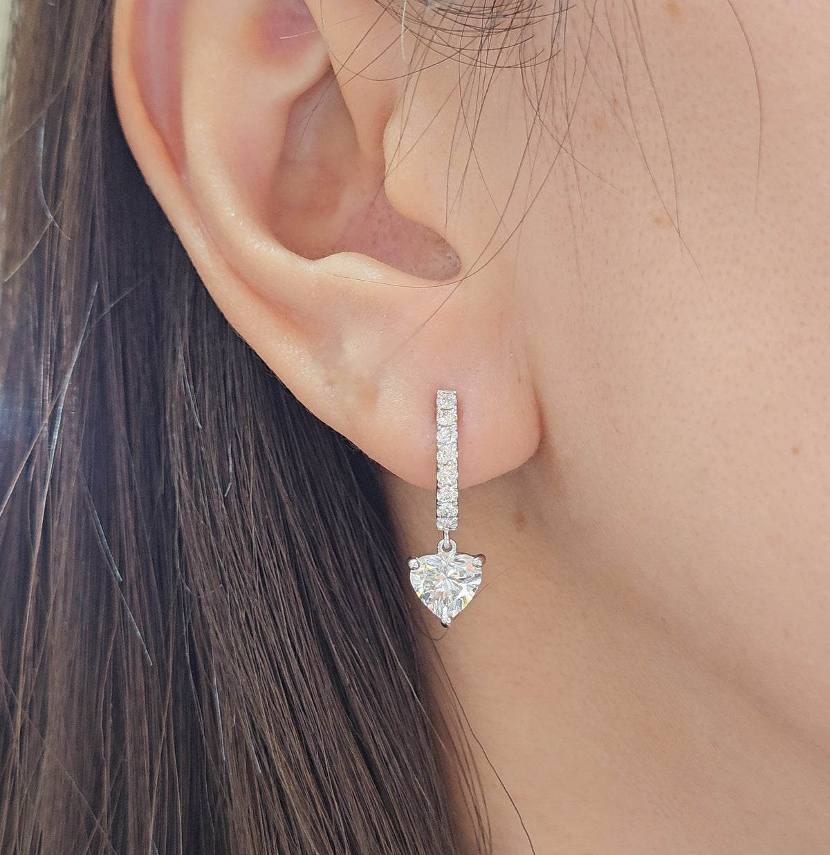 Heart Cut Diamond Hoop Earrings on ear