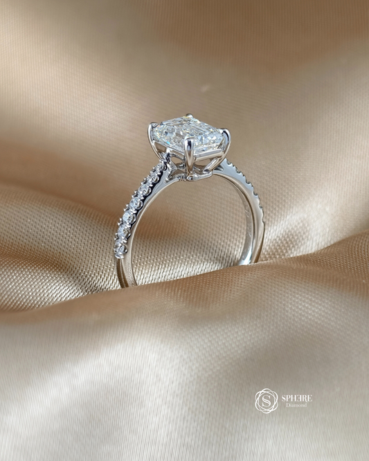Side view Emerald lab grown diamond pavé ring with IGI Certified diamond