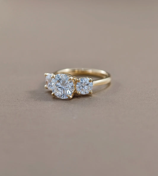 Round Three Stone Lab Grown Diamond Engagement Ring in Yellow Gold | IGI Certified