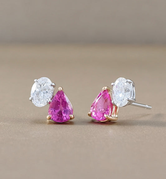 Side profile of Toi et Moi sapphire and oval lab grown diamond earrings with prong settings