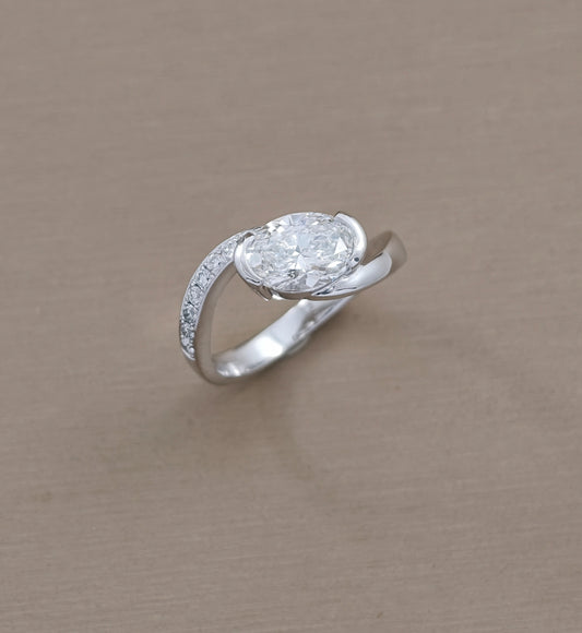 Oval Lab Grown Diamond Curved Engagement Ring in White Gold Three Quarter View