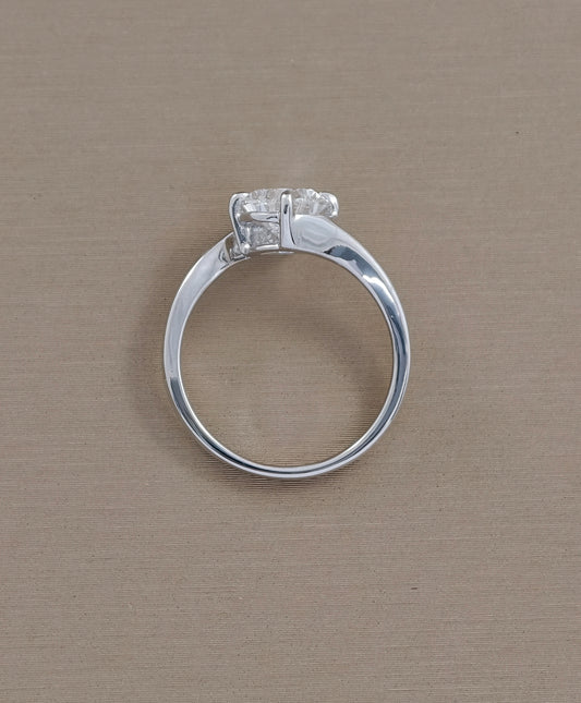 Rear view of pear cut diamond curved solitaire engagement ring showing white gold setting structure
