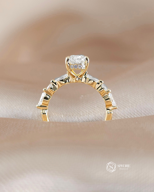 Side profile of the Emily Oval Lab Grown Diamond Engagement Ring with marquise side stones and 18K Pink Gold setting