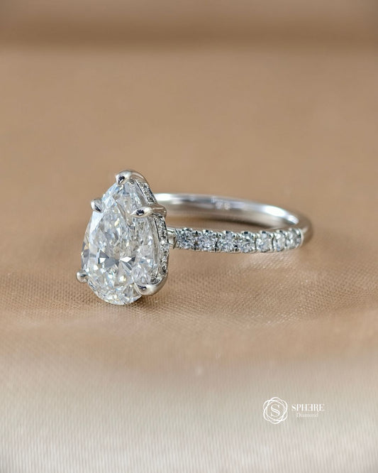 45-degree view of Luna Pear Lab Grown Diamond 5-Prong Pavé Solitaire Engagement Ring featuring an IGI Certified lab grown diamond