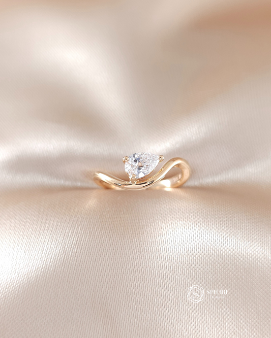 Side view of Luna pear lab grown diamond engagement ring with IGI certified diamond