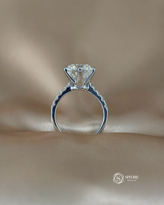 Side profile of Luna Round Lab Grown Diamond Pavé Solitaire Engagement Ring featuring six-prong setting and IGI Certified center diamond