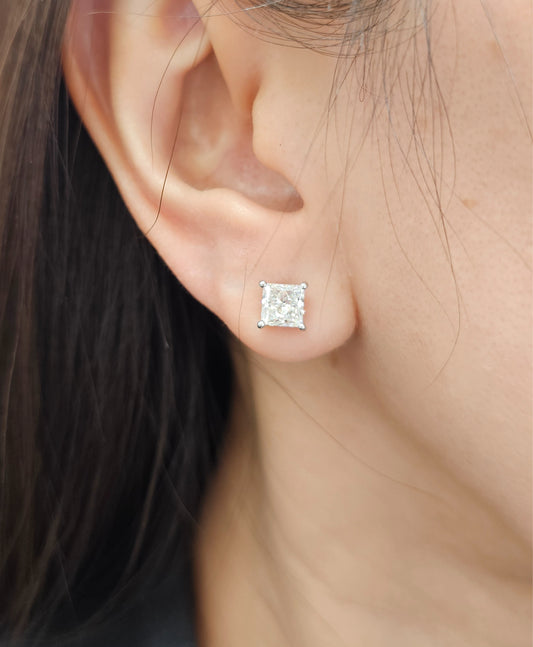 Woman wearing Princess lab grown diamond stud earrings in Bangkok | Sphere Diamond