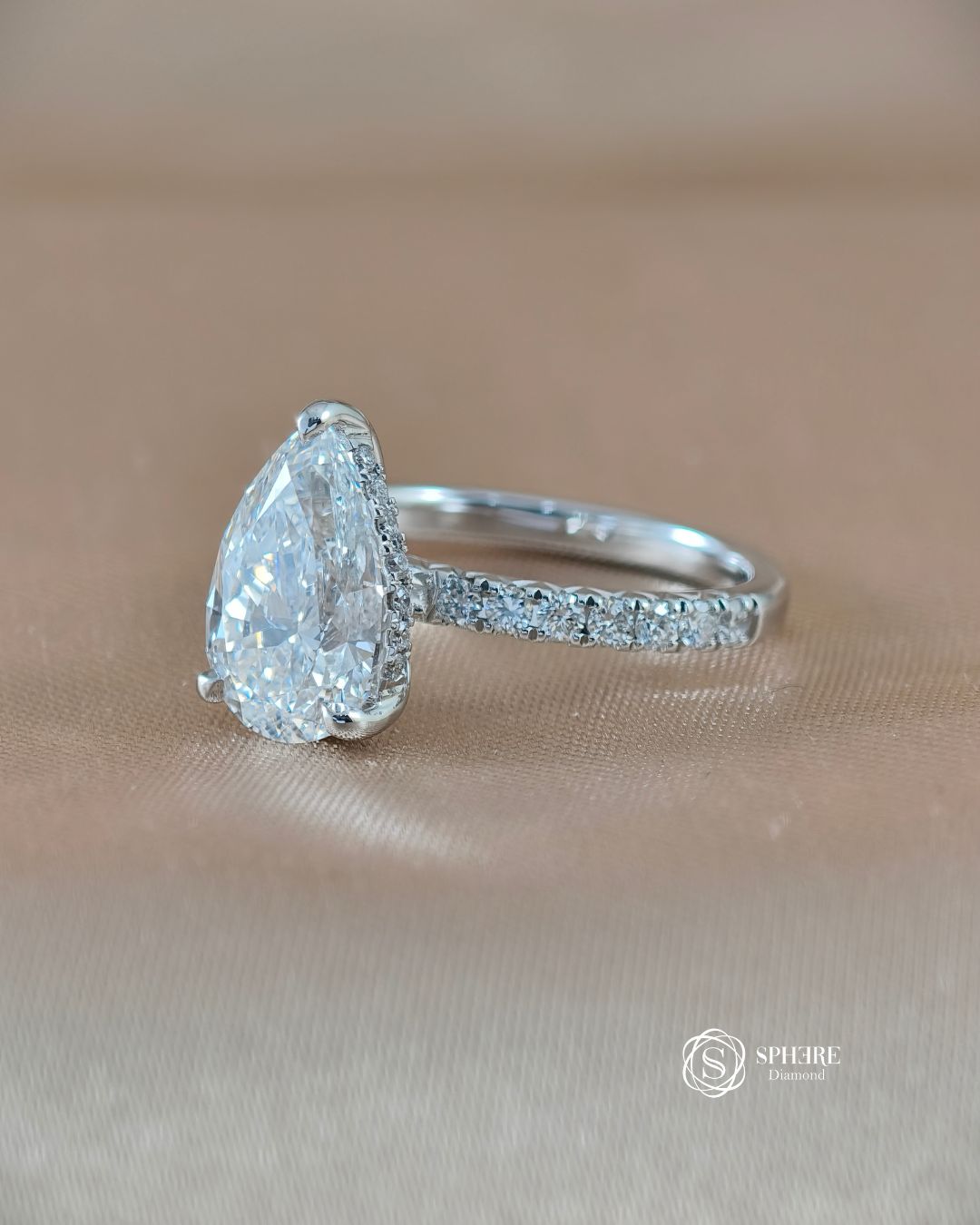 Pear Shape Diamond Ring with 5 Prong Pave Setting