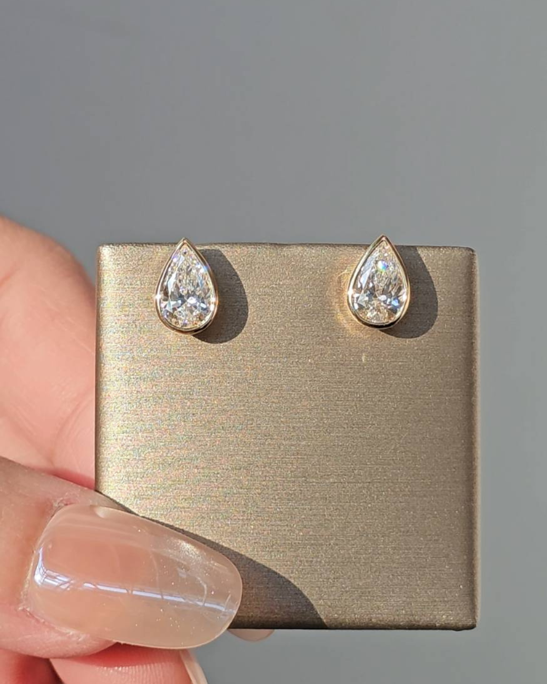 Pear Cut Bezel Love Earring