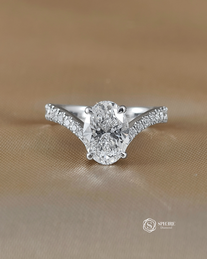 Oval Diamond Ring with Curved Pave Band in White Gold