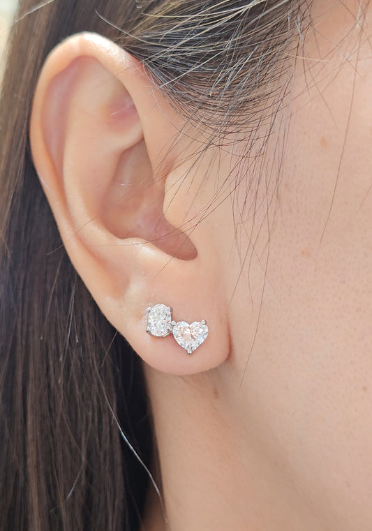 Oval &amp; Heart Cut Lab Grown Diamond Stud Earrings on ear