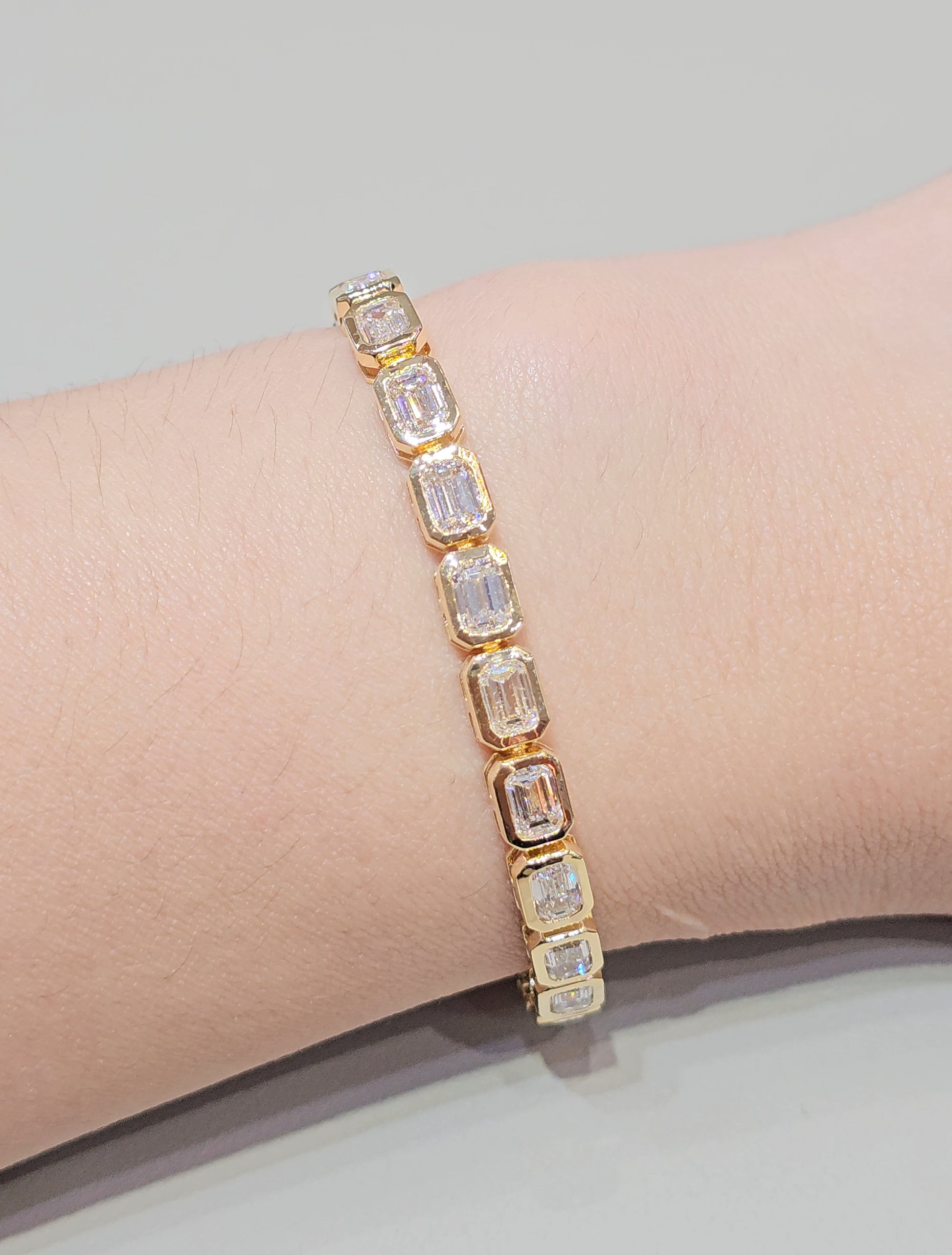 Emerald Cut Lab Grown Diamond Bracelet worn on wrist Sphere Diamond