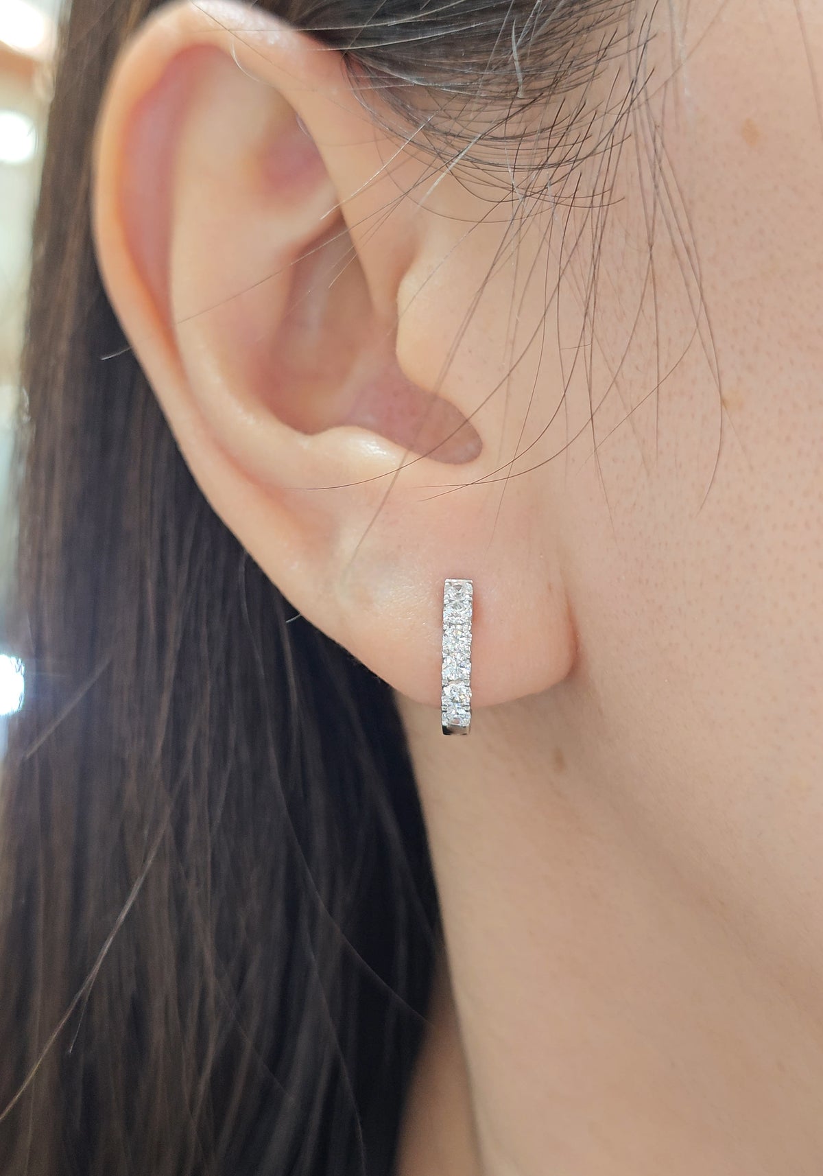 Diamond Pavé Hoop Earrings on ear