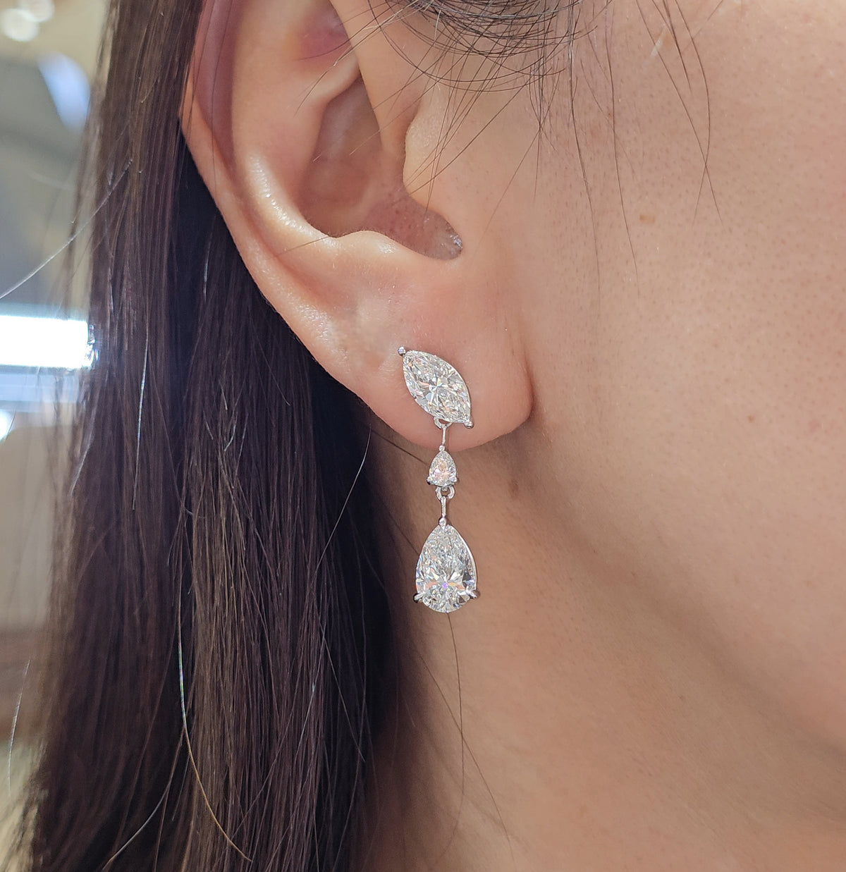 Vela Marquise, Oval & Pear Three Stone Lab Grown Diamond Drop Earrings on ear