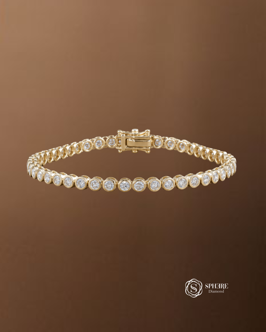 Round bezel set lab grown diamond tennis bracelet in yellow gold, full bracelet view by Sphere Diamond Bangkok
