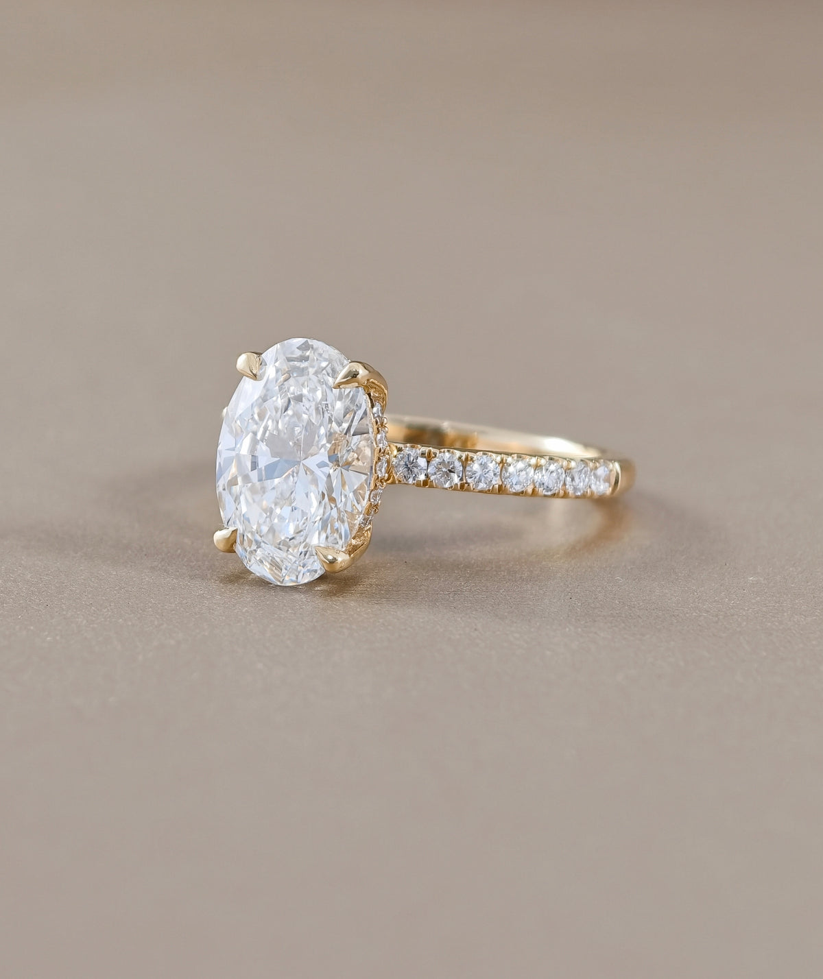 Signature Eiffel love oval lab grown diamond engagement ring in yellow gold | IGI Certified