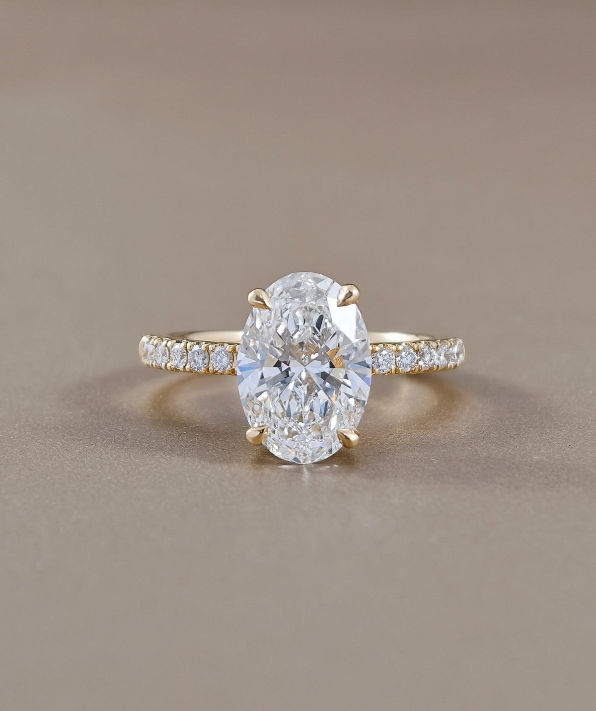 Signature Eiffel love oval lab grown diamond engagement ring in yellow gold | IGI Certified