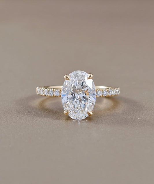 Signature Eiffel love oval lab grown diamond engagement ring in yellow gold | IGI Certified