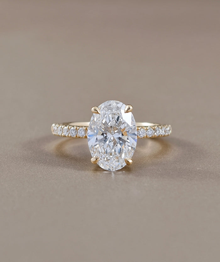 Signature Eiffel love oval lab grown diamond engagement ring in yellow gold | IGI Certified