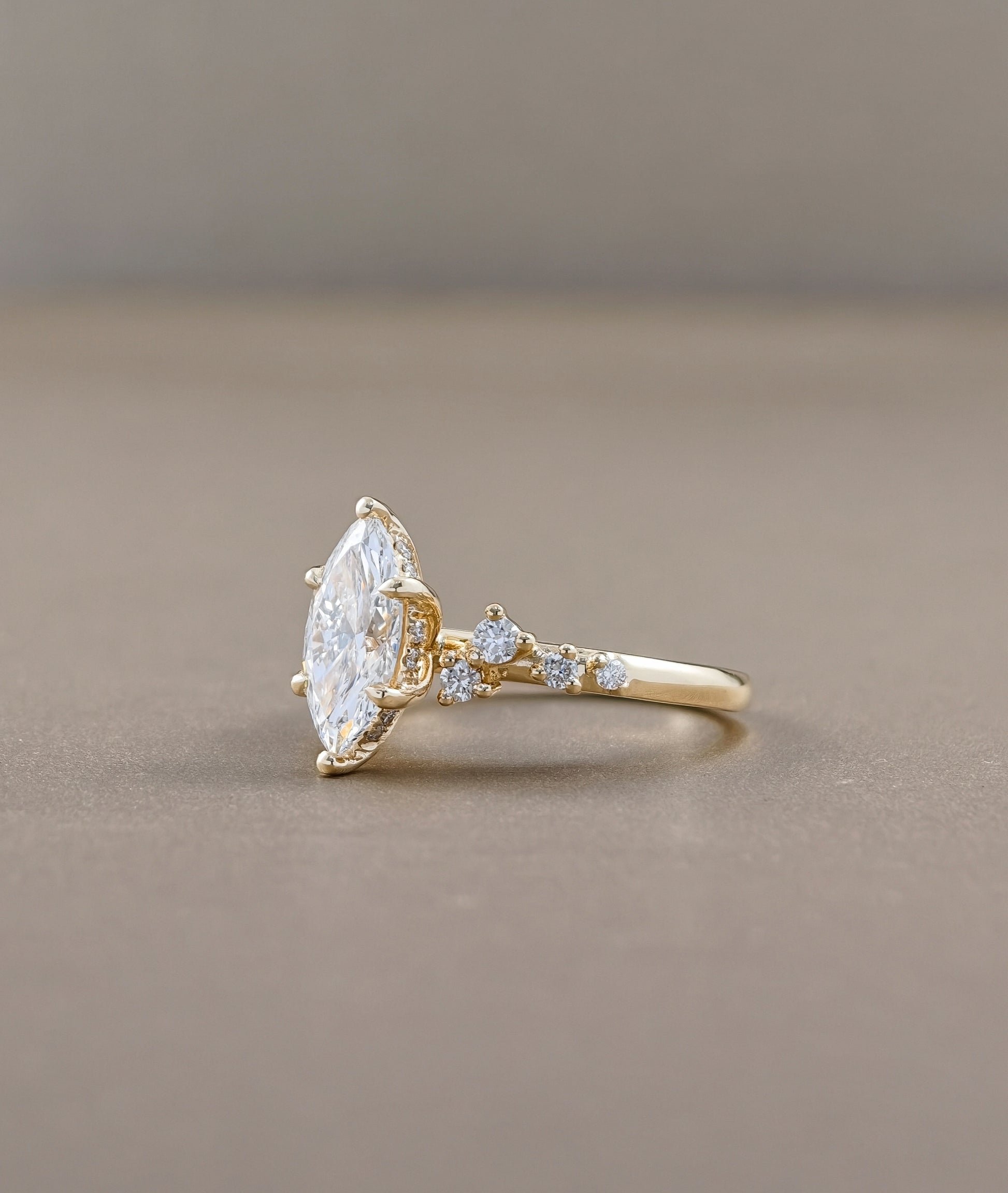 Yellow Gold Marquise Lab Grown Diamond Ring with leaf inspired accents