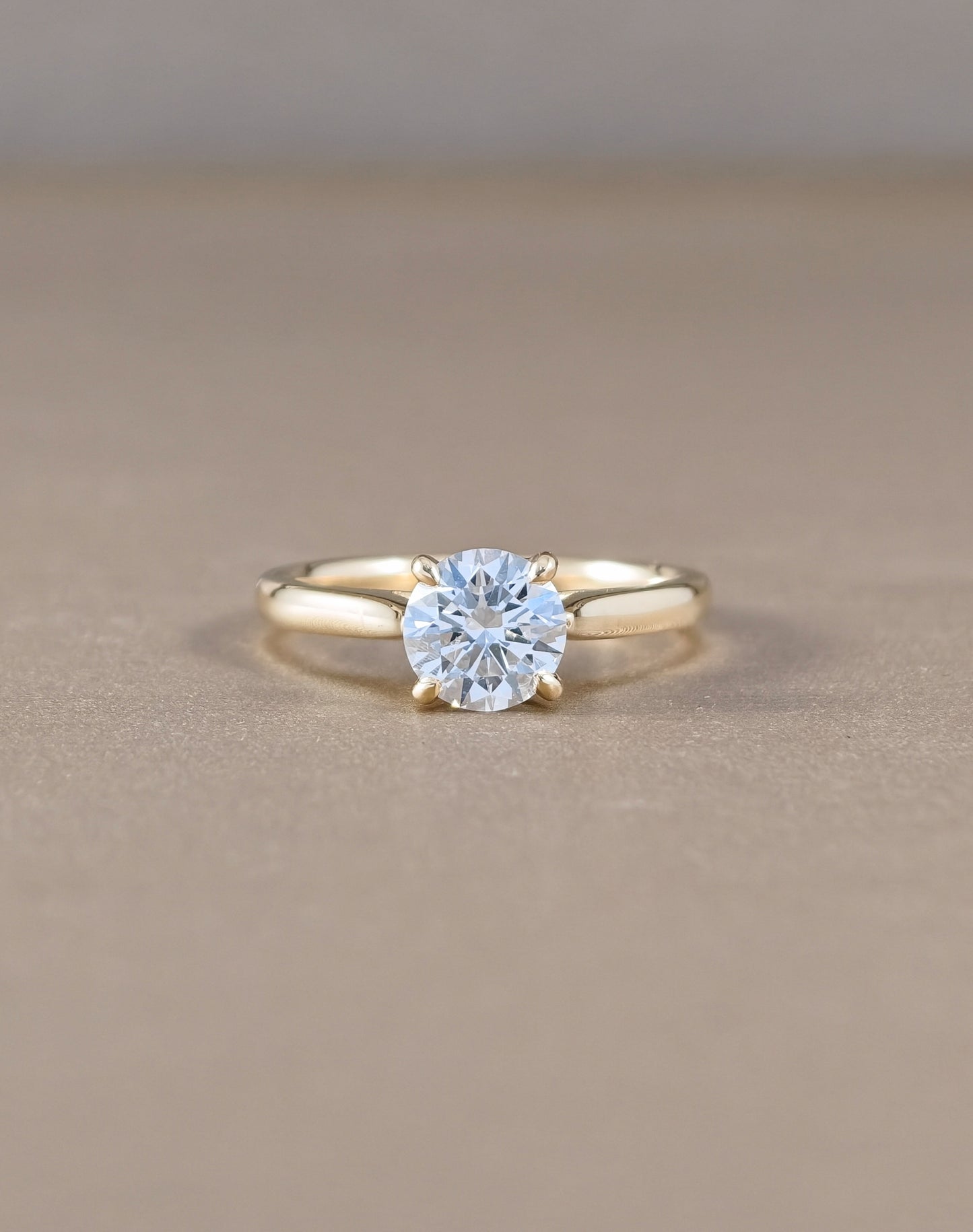 Aurelia Round Brilliant Lab Grown Diamond Tapered Solitaire Engagement Ring in Yellow Gold Sphere Diamond Bangkok