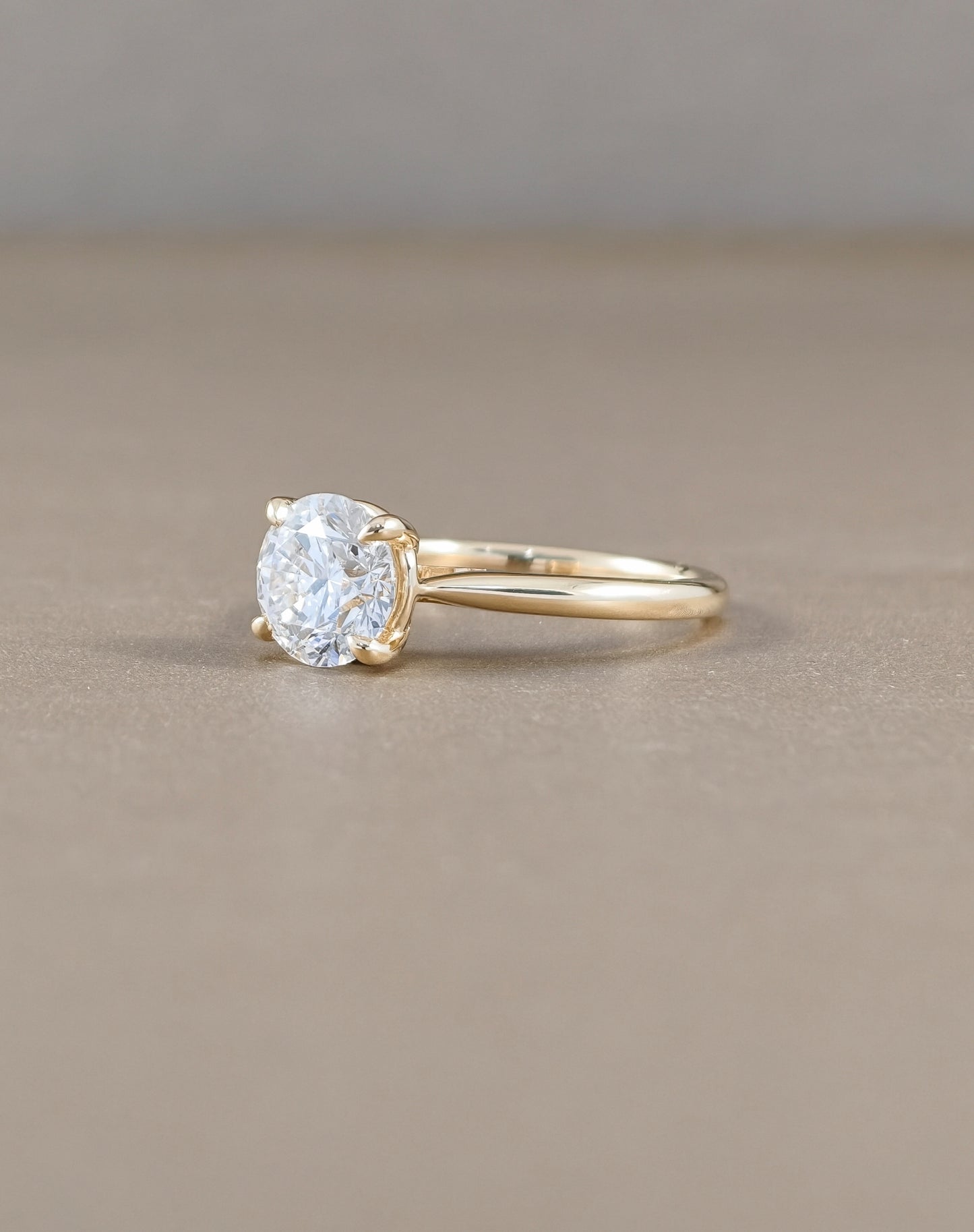 Round Cut Lab Grown Diamond Yellow Gold Solitaire Engagement Ring side view