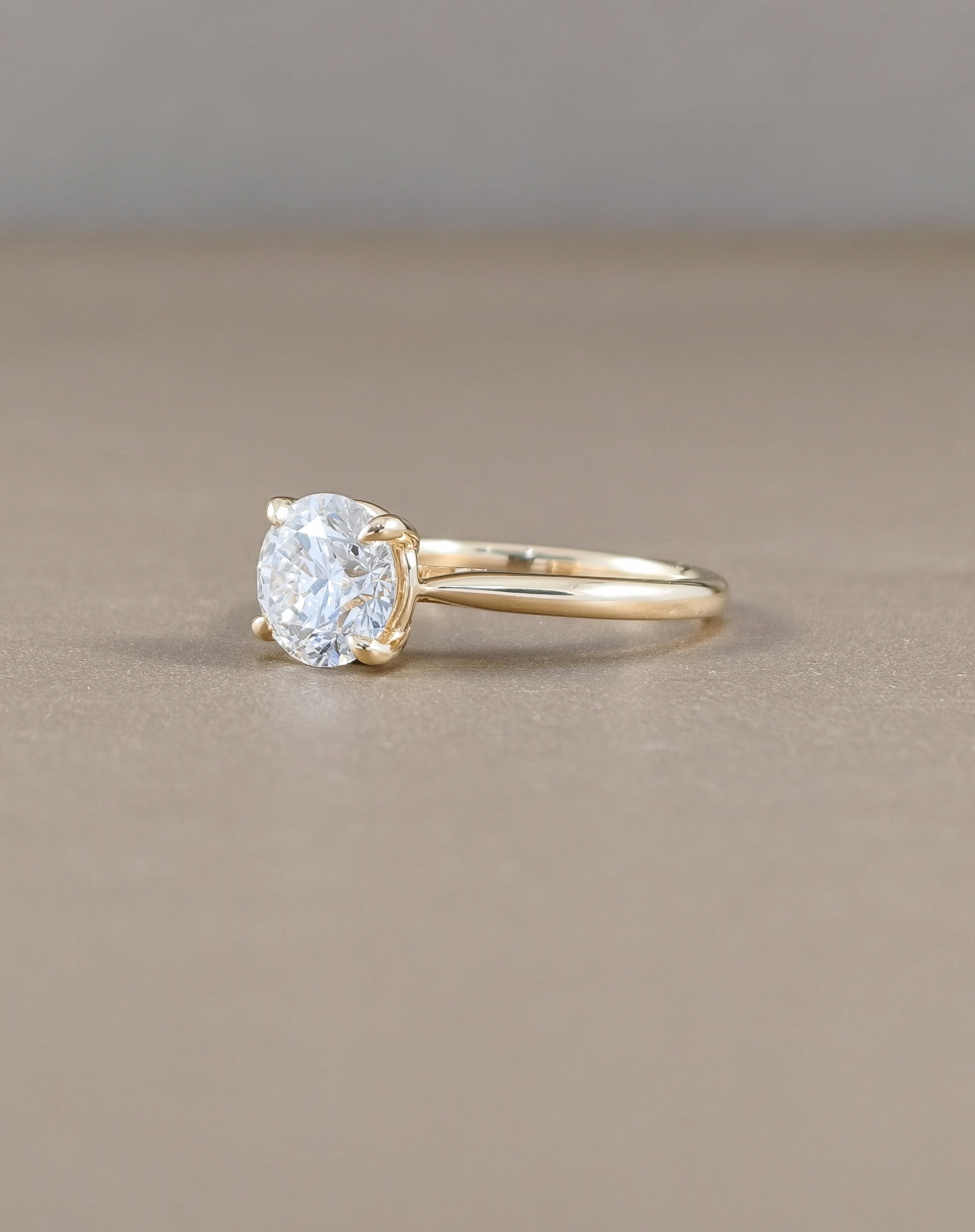 Round Cut Lab Grown Diamond Yellow Gold Solitaire Engagement Ring side view