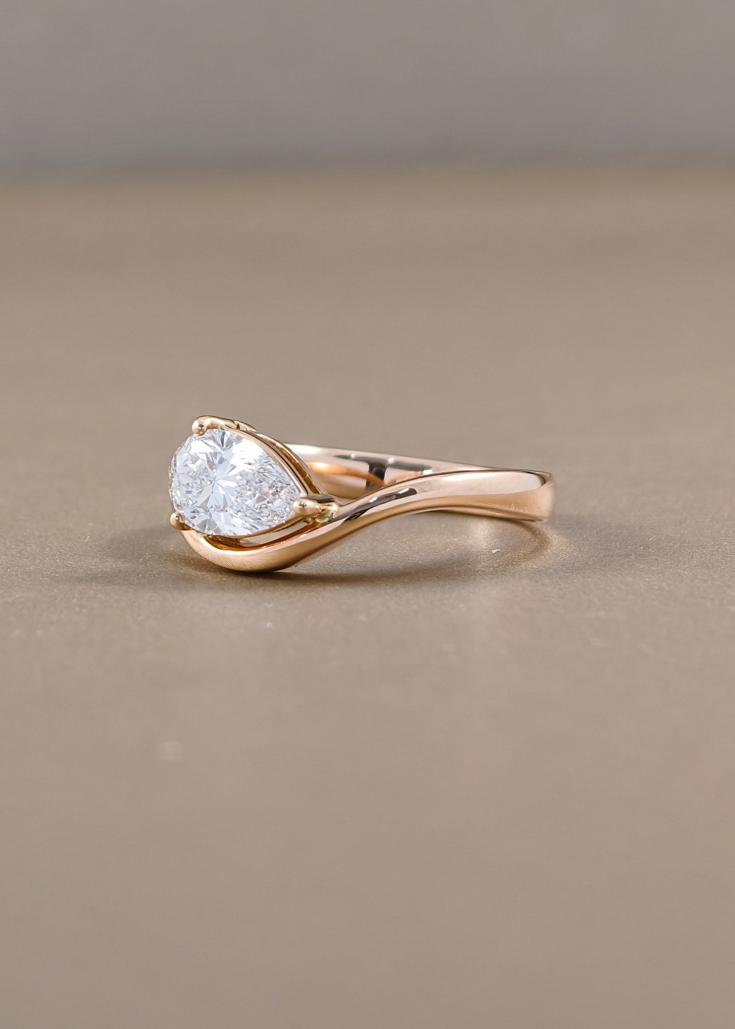 Rosalie Pear Cut Lab Grown Diamond Crossover Engagement Ring in Pink Gold Sphere Diamond Bangkok