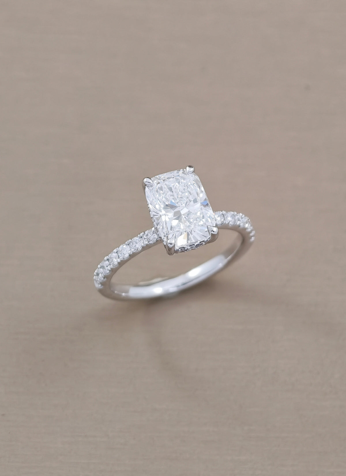Cushion cut pave diamond lab grown in Brown background