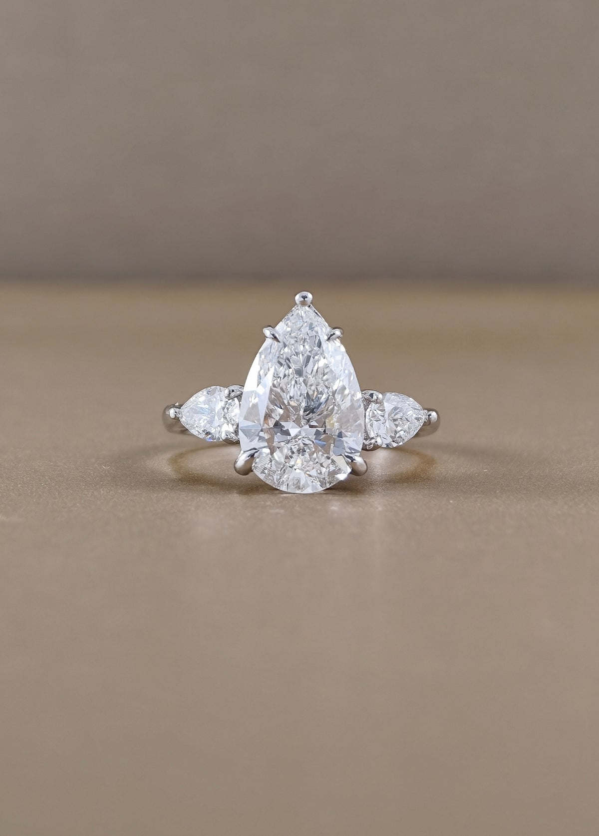 Pear Lab Grown Diamond Three Stone Engagement Ring with Pear Side Stones | IGI Certified