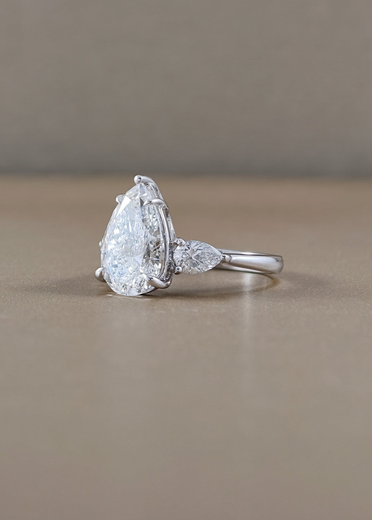 Pear Lab Grown Diamond Three Stone Engagement Ring with Pear Side Stones | IGI Certified