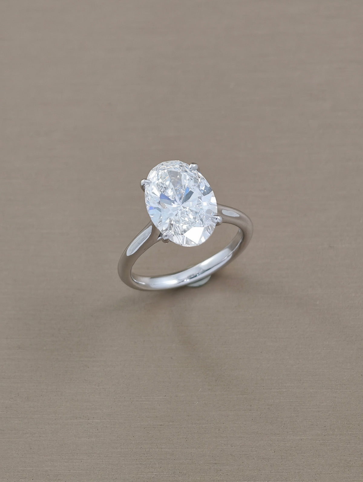 Oval Cut Lab Grown Diamond Engagement Ring Four-Prong Cathedral Setting