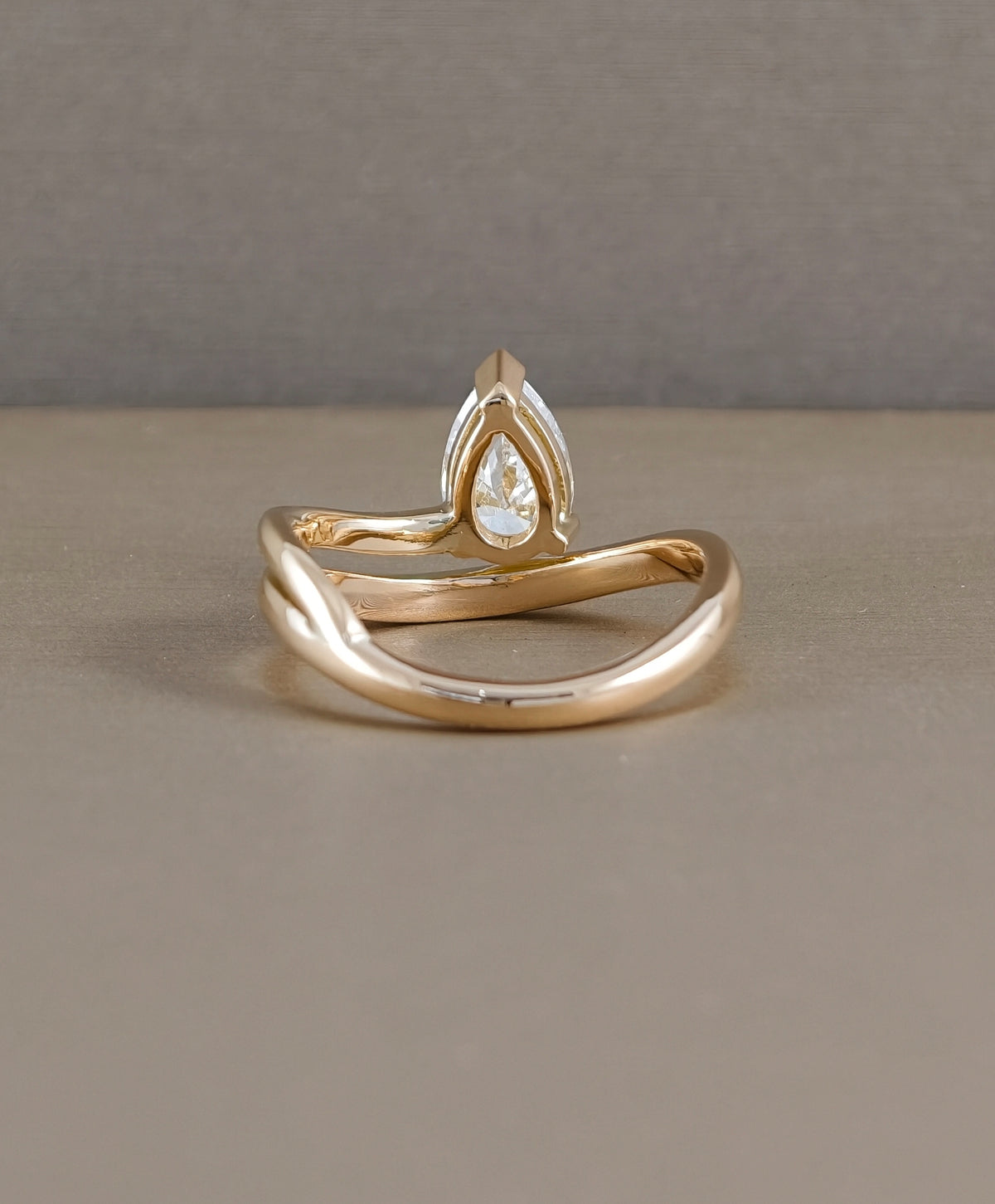 Pear  Double Curved Lab Grown Diamond  Engagement Ring in Pink Gold