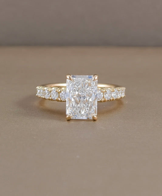 Radiant cut lab grown diamond engagement ring with pavé diamond band in yellow gold by Sphere Diamond Bangkok