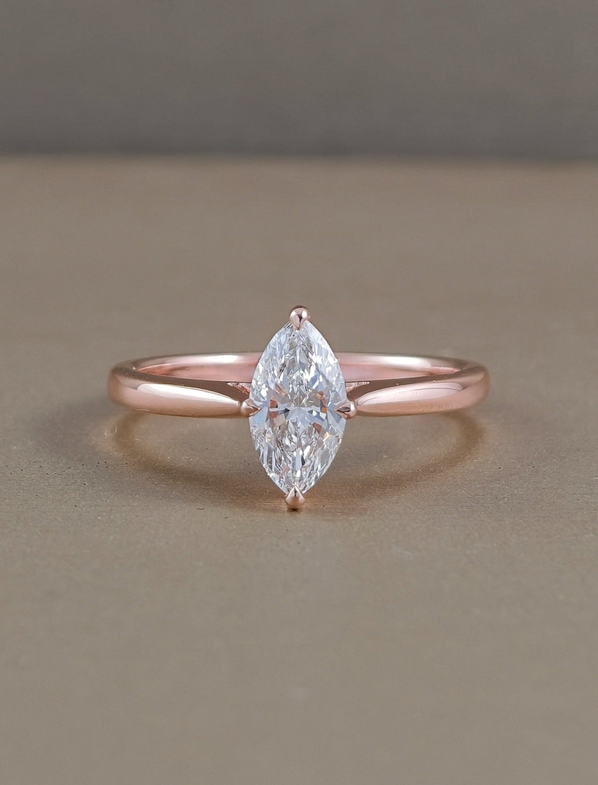 Marquise cut solitaire lab grown diamond engagement ring in rose gold, front view, Sphere Diamond Bangkok