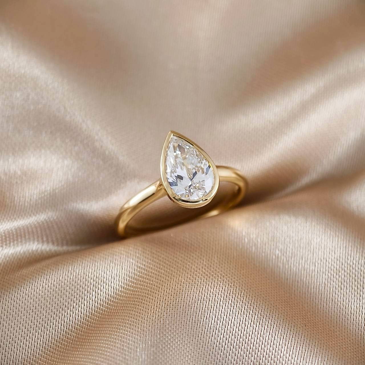 Pear Cut Bezel Love Ring