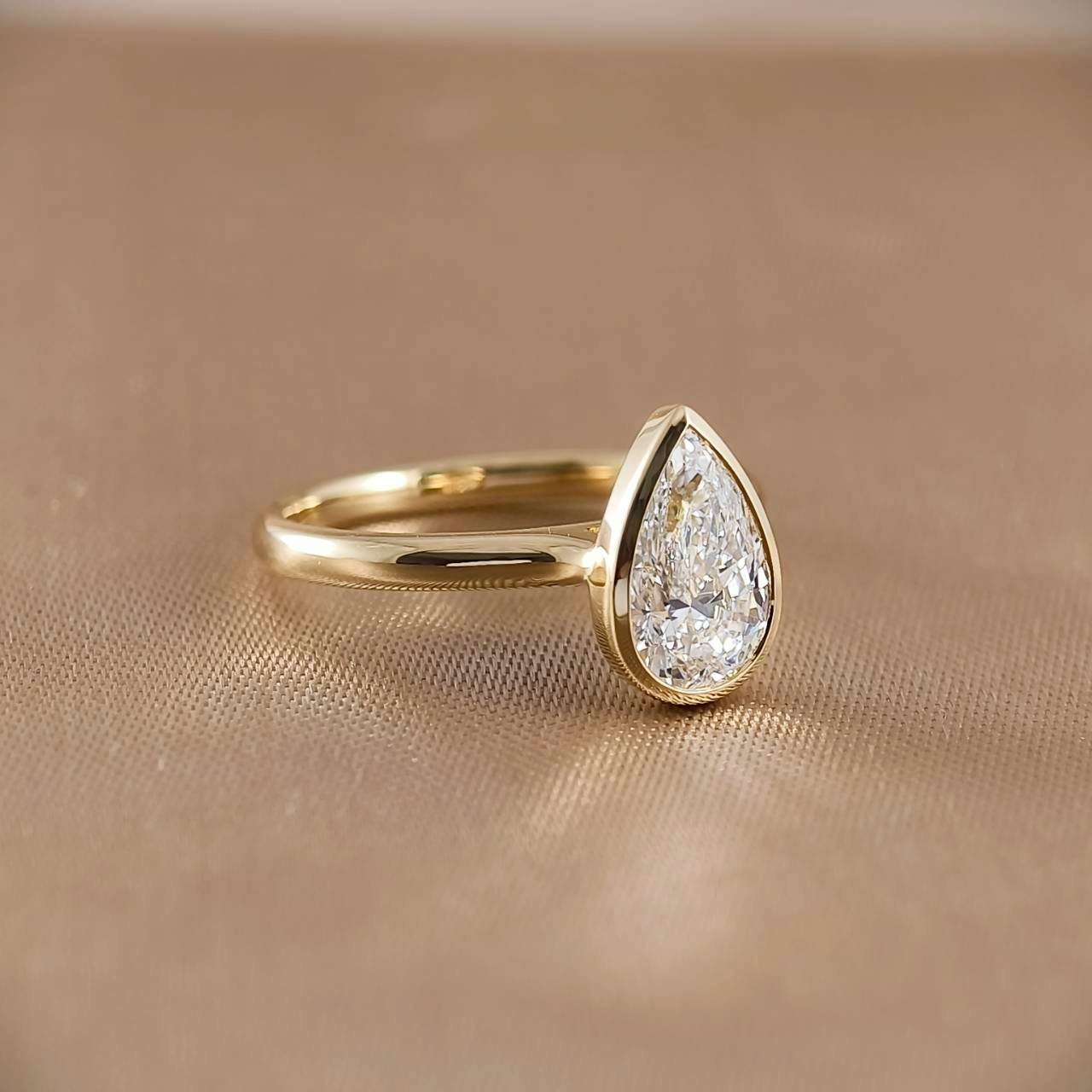 Pear Cut Bezel Love Ring