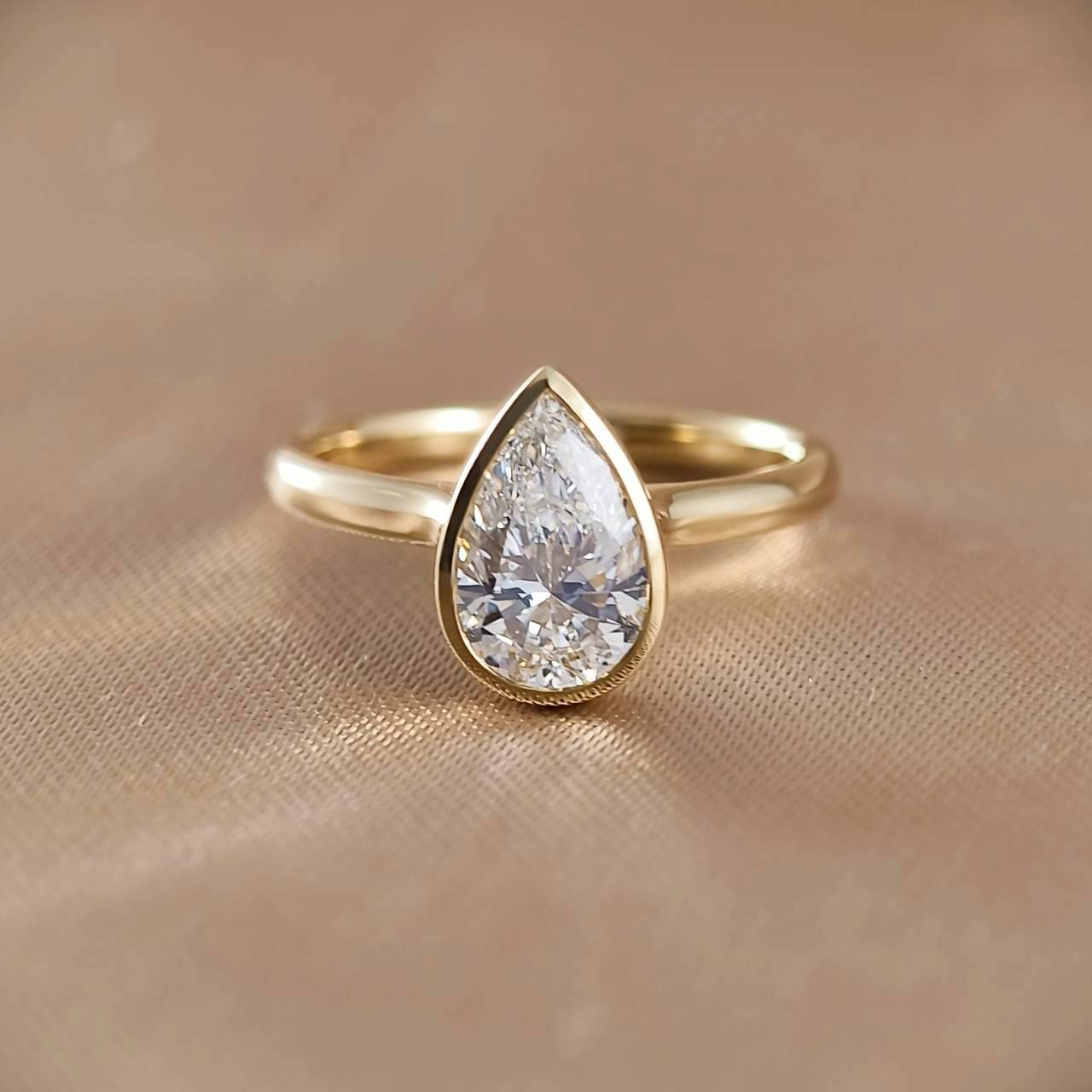 Pear Cut Bezel Love Ring