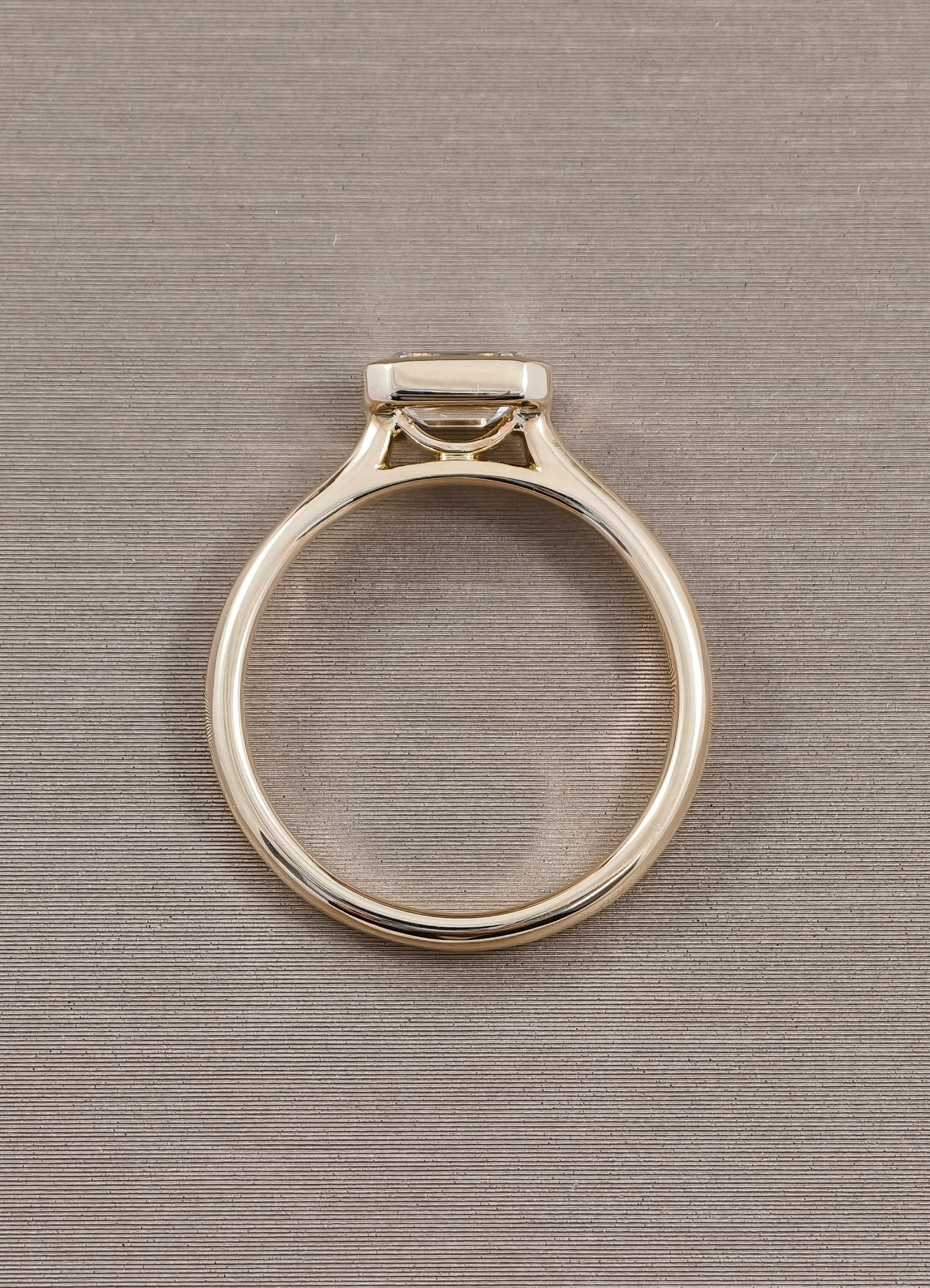 East-West Emerald Cut Lab Grown Diamond Bezel Engagement Ring in Yellow Gold by Sphere Diamond Bangkok