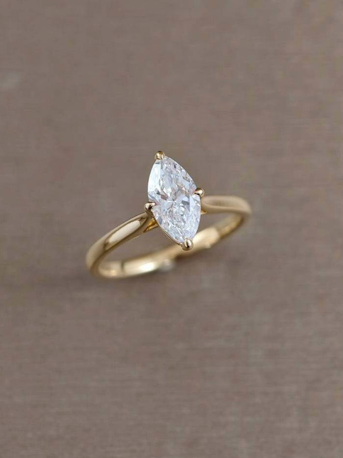 Elegant Marquise Solitaire Lab Grown Diamond Ring handcrafted in 18K Yellow Gold by Sphere Diamond Thailand