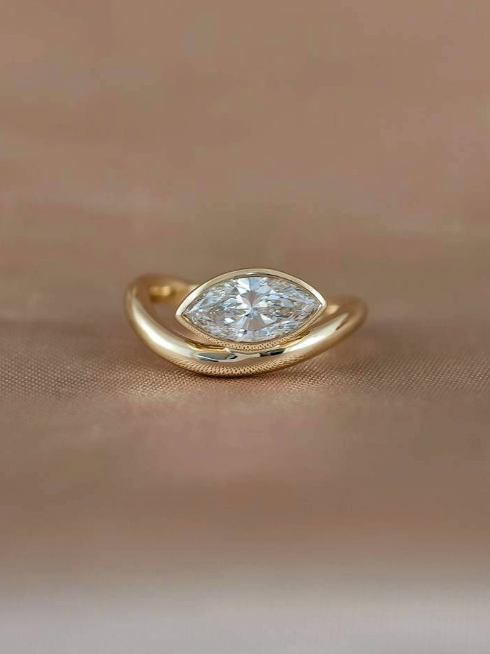 East-west Marquise Lab grown diamond ring in bezel setting