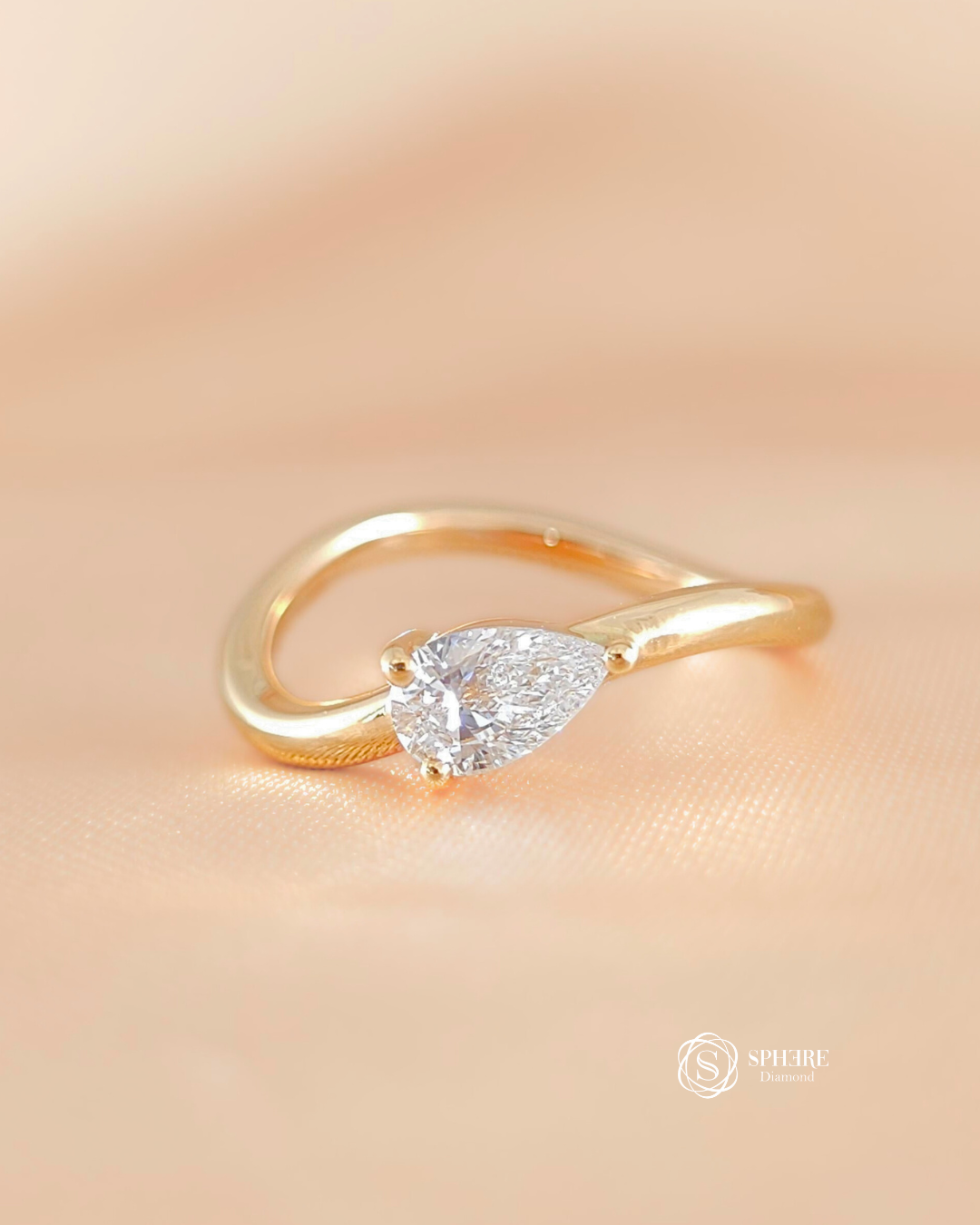 Pear Cut Diamond Curve Ring