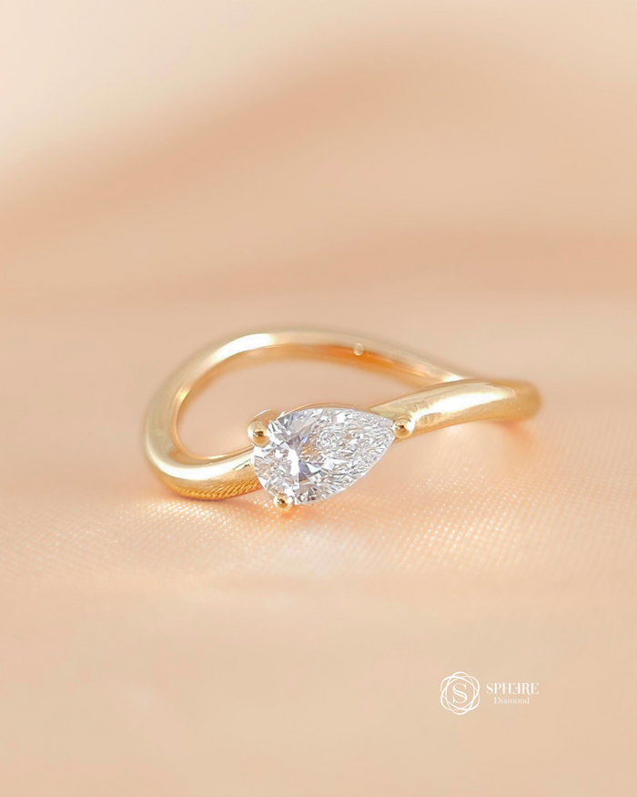 Pear Cut Diamond Curve Ring