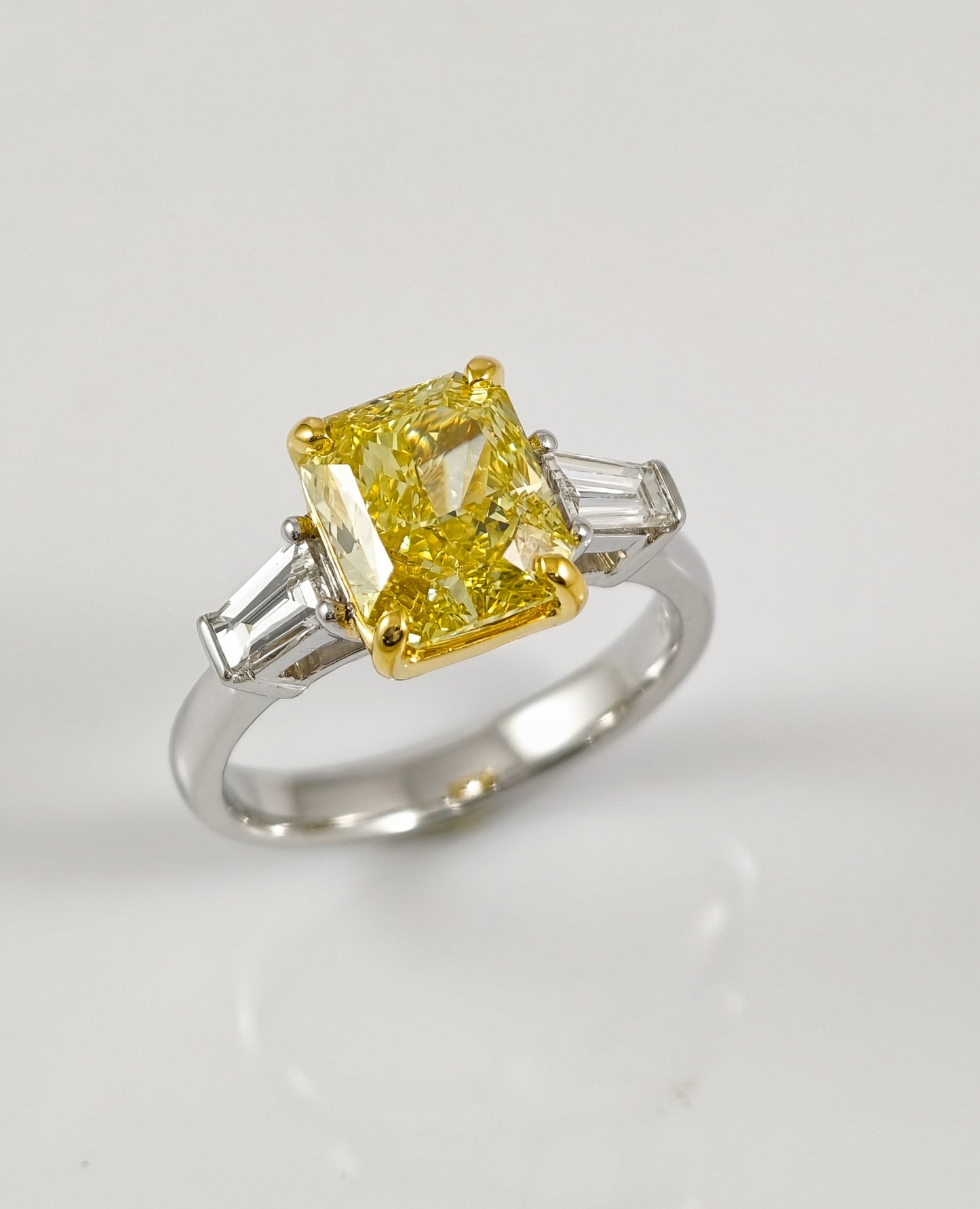 Fancy Yellow Radiant Cut Lab Grown Diamond Engagement Ring with Tapered Baguettes | IGI Certified