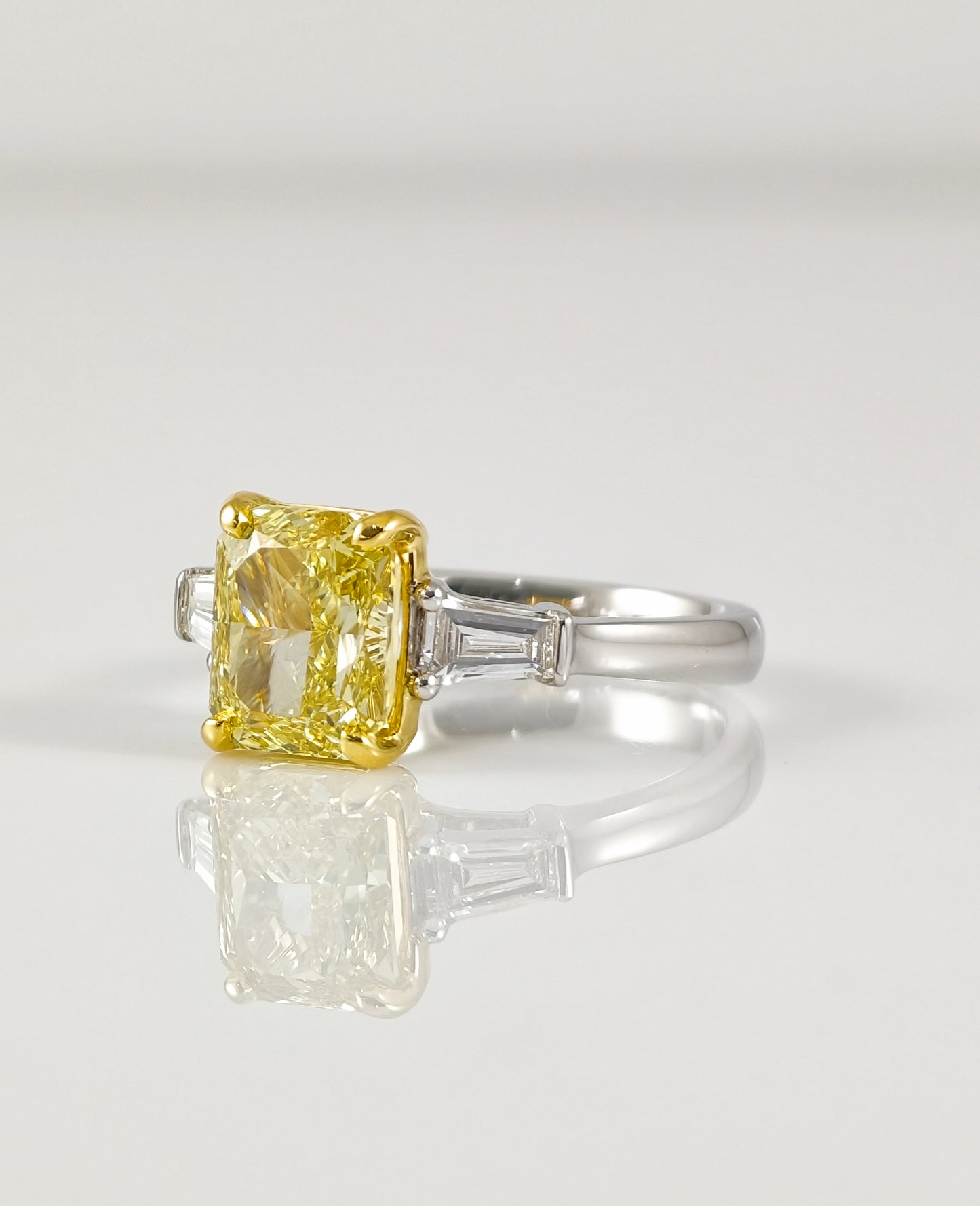 Fancy Yellow Radiant Cut Lab Grown Diamond Engagement Ring with Tapered Baguettes | IGI Certified