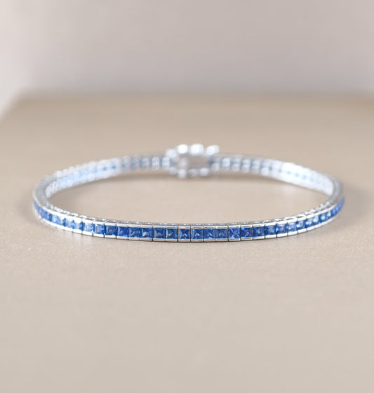 Princess cut blue sapphire tennis bracelet