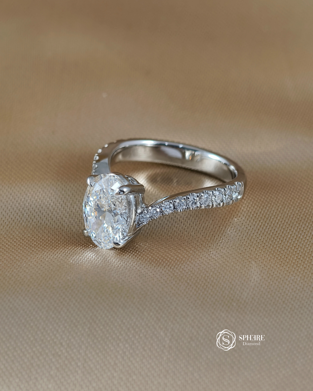 Close-up of Aurelia Oval Lab Grown Diamond Engagement Ring featuring a pavé twist band and 18K White Gold setting