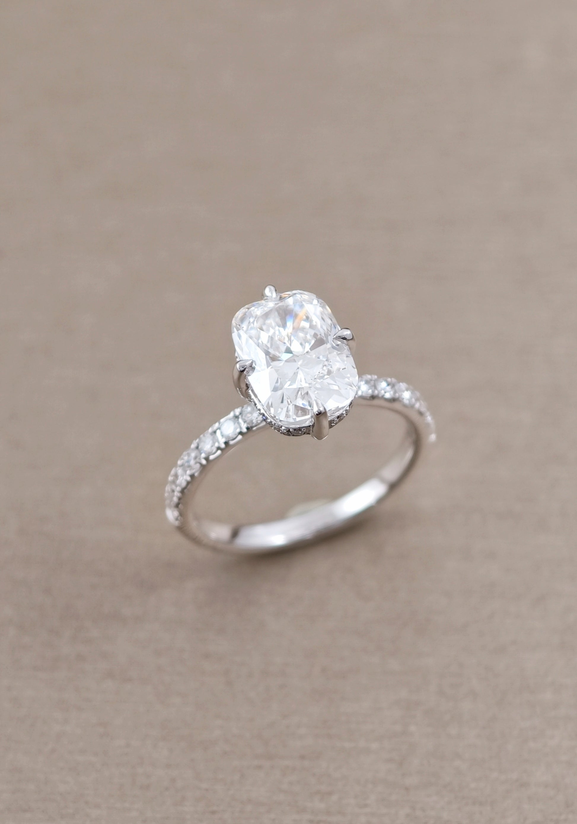 Angled view of Cushion Lab Grown Diamond Hidden Halo Pavé Engagement Ring in Bangkok | Sphere Diamond