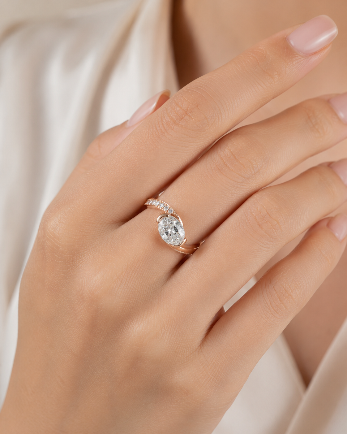 Aurora Oval Curve Half Pavé Lab Grown Diamond Engagement Ring worn on hand in 18K Rose Gold by Sphere Diamond Bangkok featuring an IGI Certified oval lab grown diamond